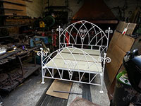 A forged double bed frame..